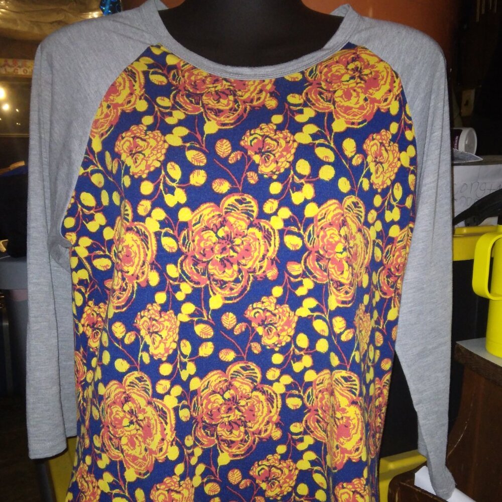 2 floral LulaRoe sz.M semi long sleeve shirts